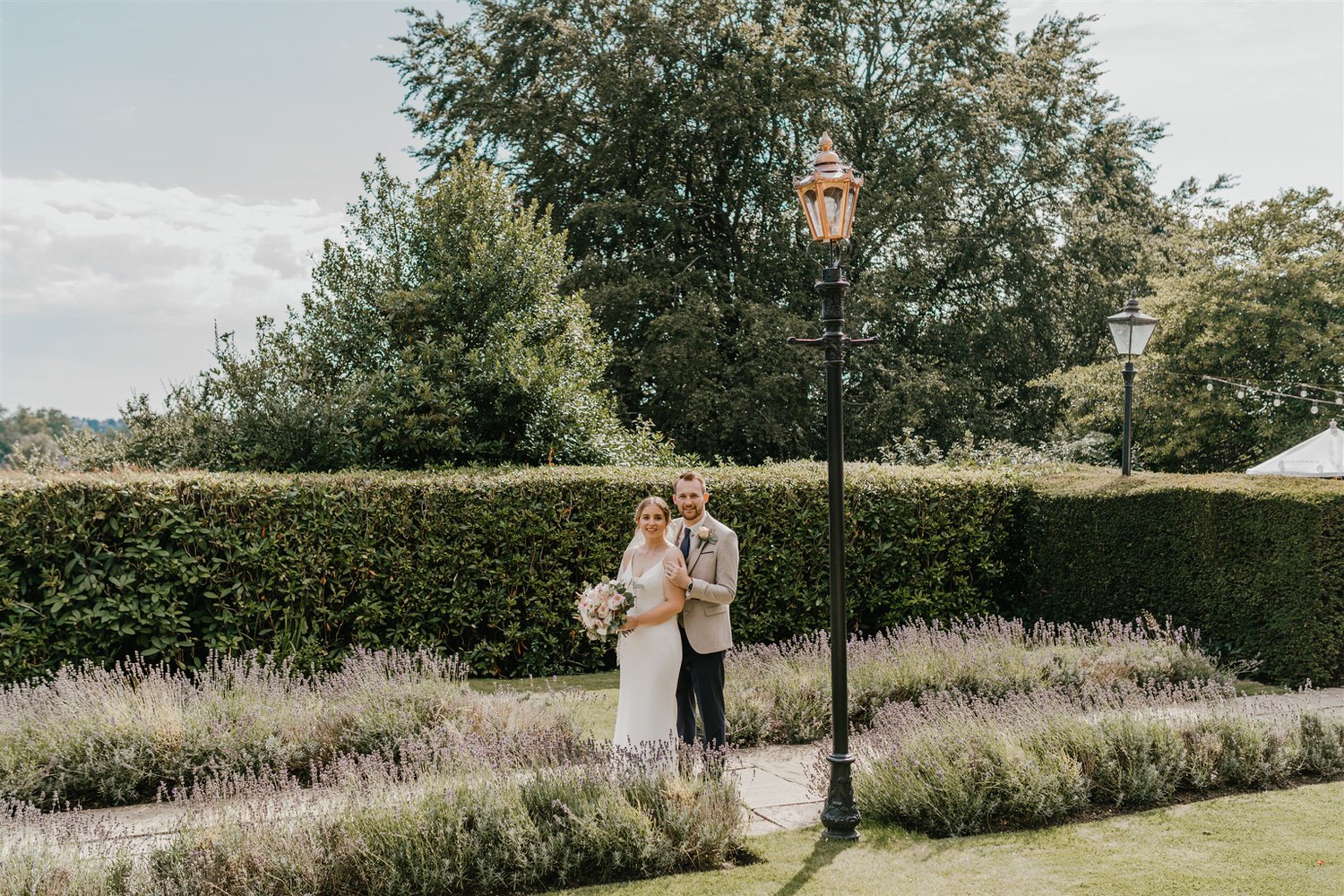 bride and groom couple portraits in the gardens at hotel du vin wedding in tunbridge wells