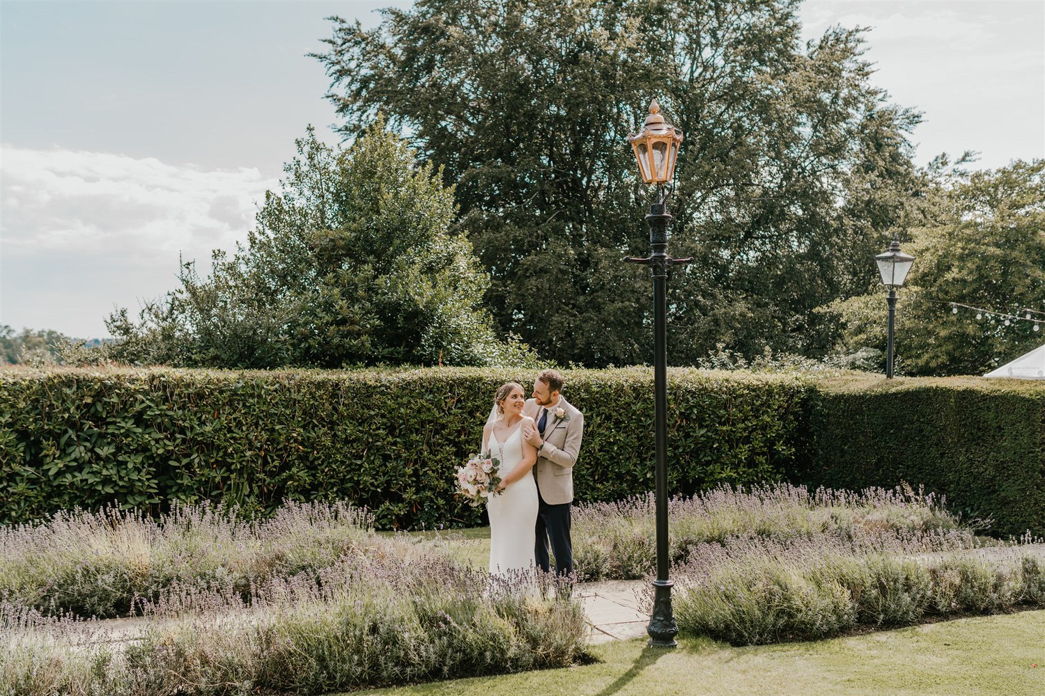 bride and groom couple portraits in the gardens at hotel du vin wedding in tunbridge wells
