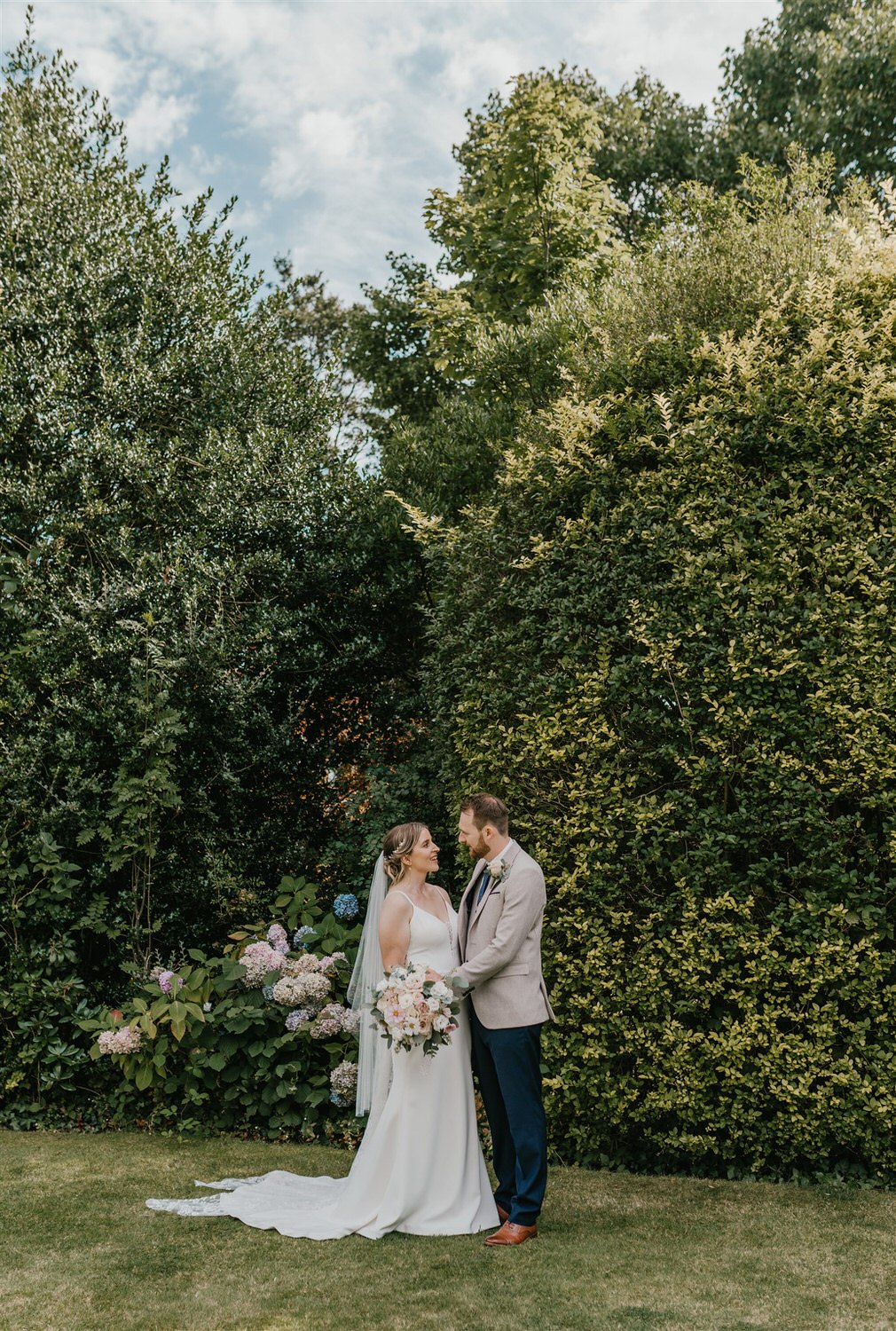 bride and groom couple portraits in the gardens at hotel du vin wedding in tunbridge wells