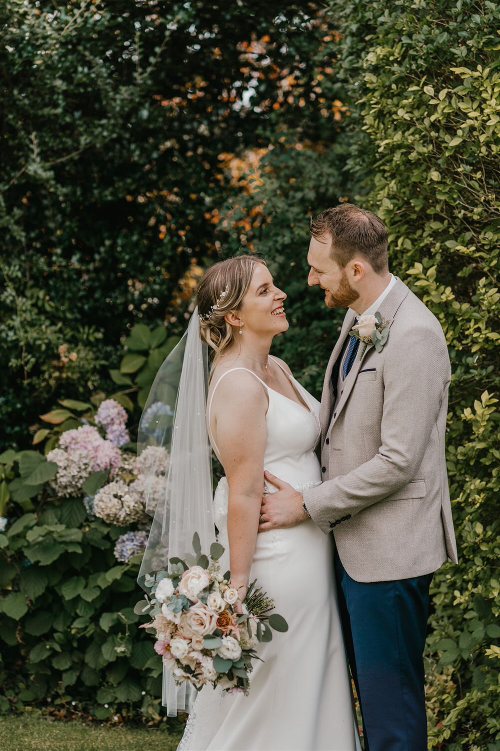 bride and groom couple portraits in the gardens at hotel du vin wedding in tunbridge wells