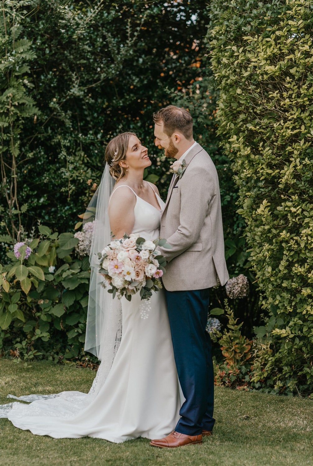 bride and groom couple portraits in the gardens at hotel du vin wedding in tunbridge wells