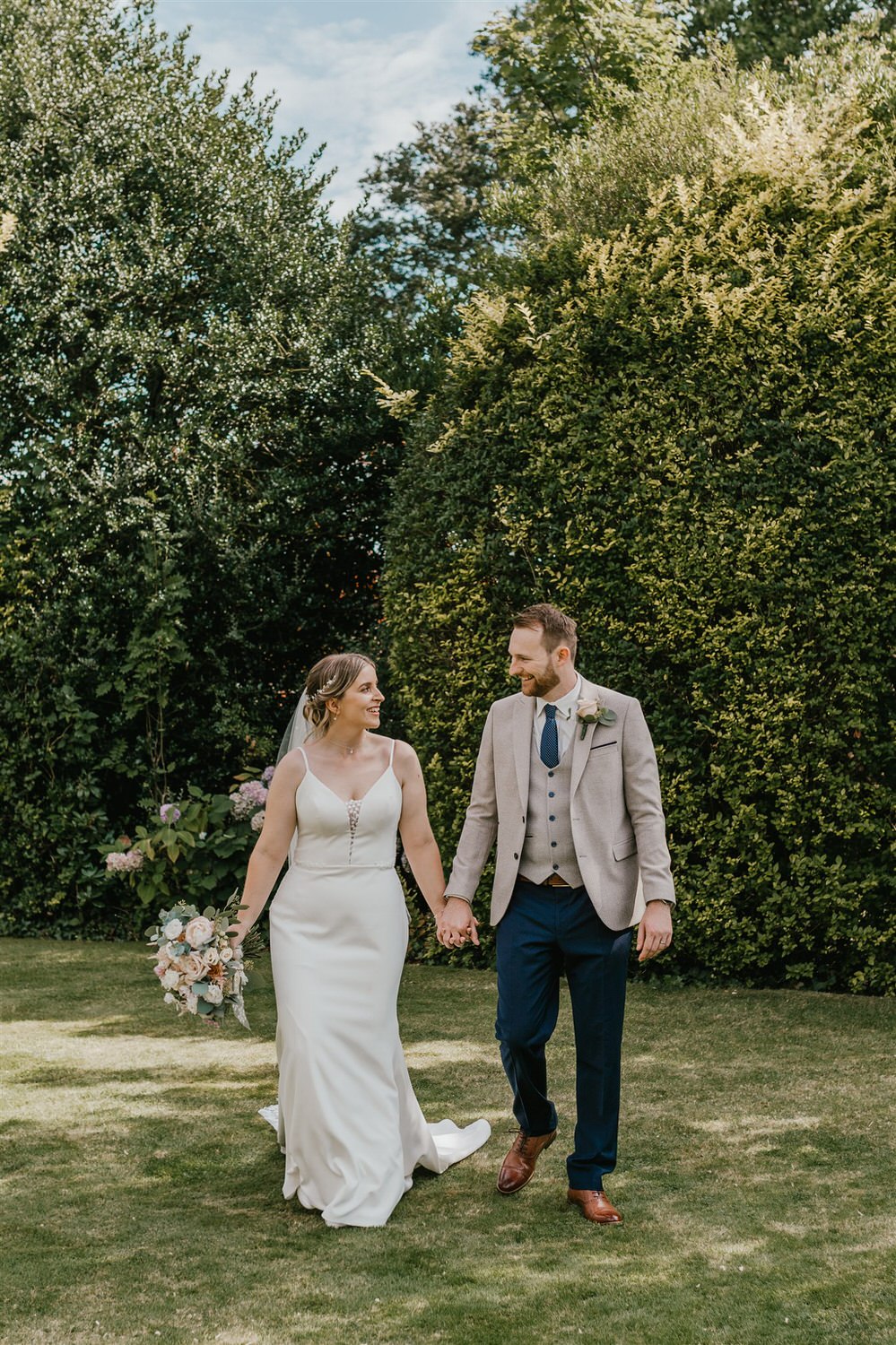 bride and groom couple portraits in the gardens at hotel du vin wedding in tunbridge wells