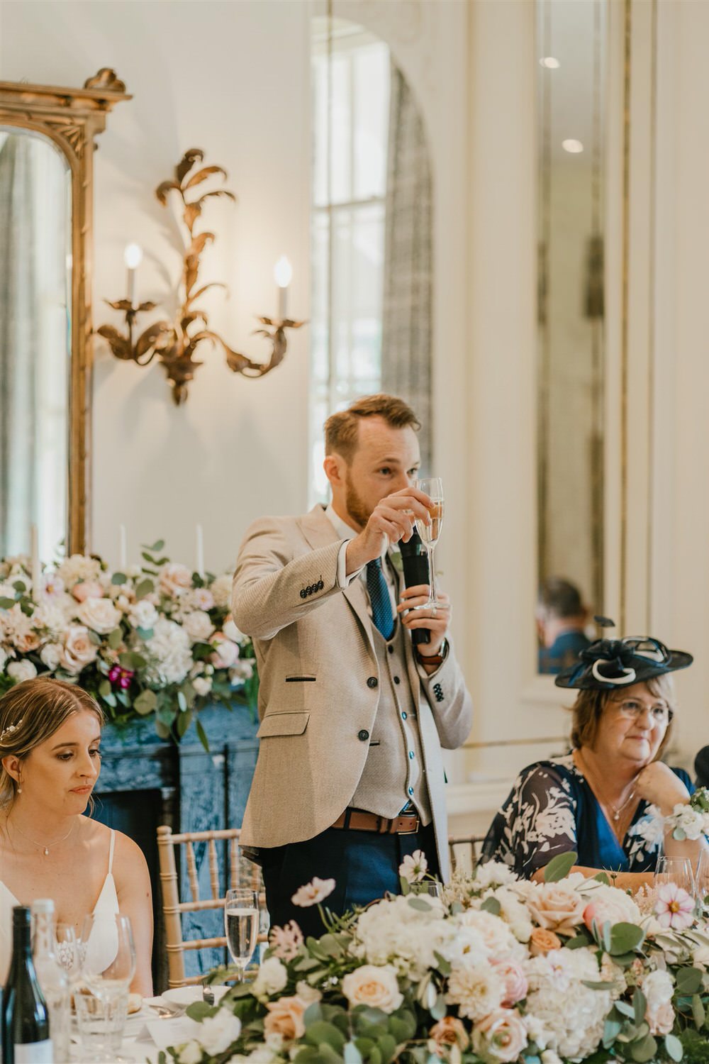 groom makes a toast during his speech in the ballroom at hotel du vin tunbridge wells