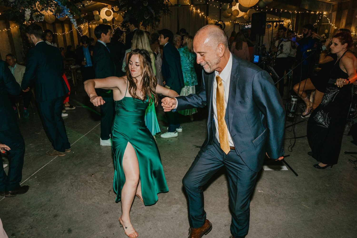 wedding guests on the dance floor at diy wedding in oxfordshire