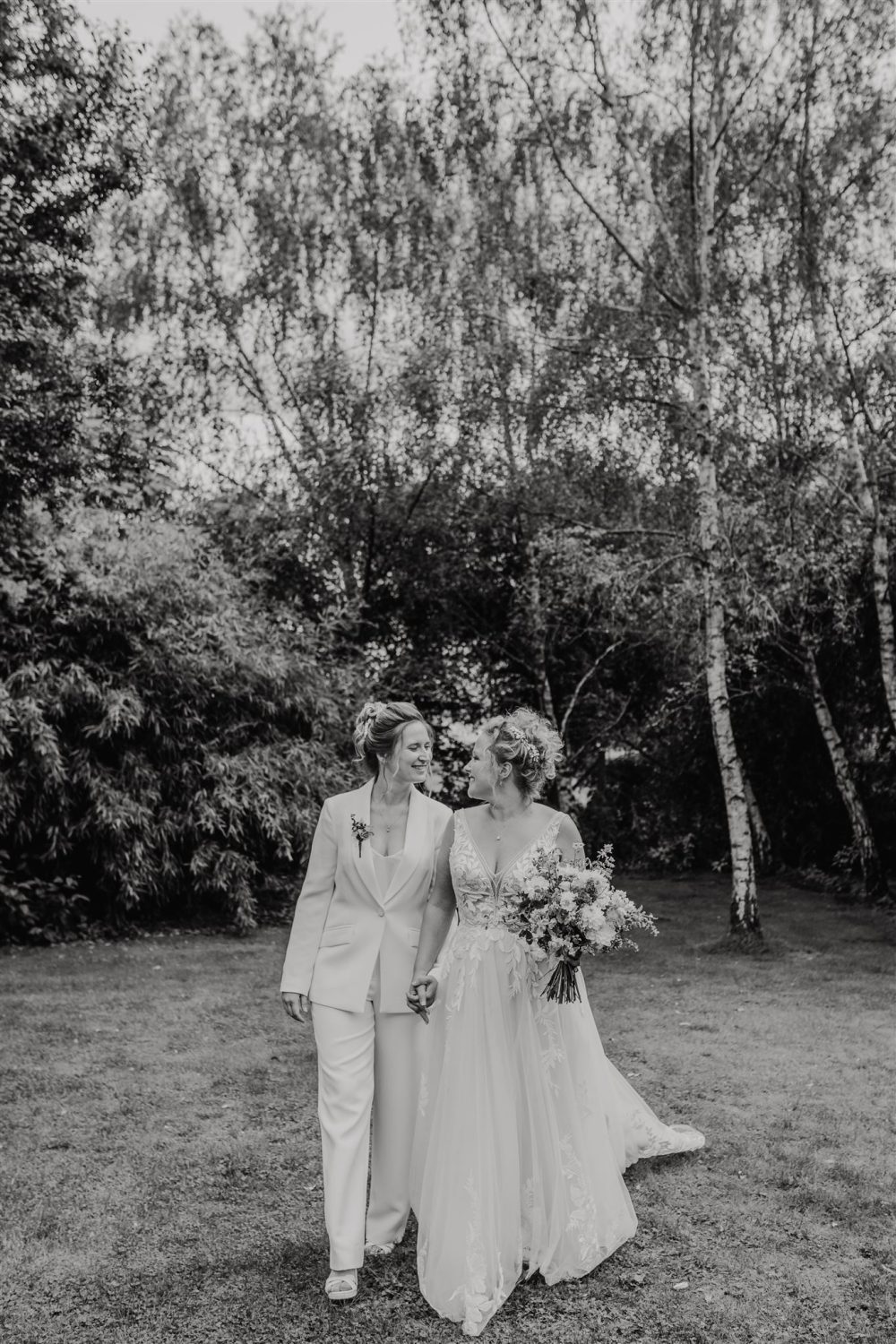 black and white couple portraits in gardens at acorn barn wedding venue in oxfordshire