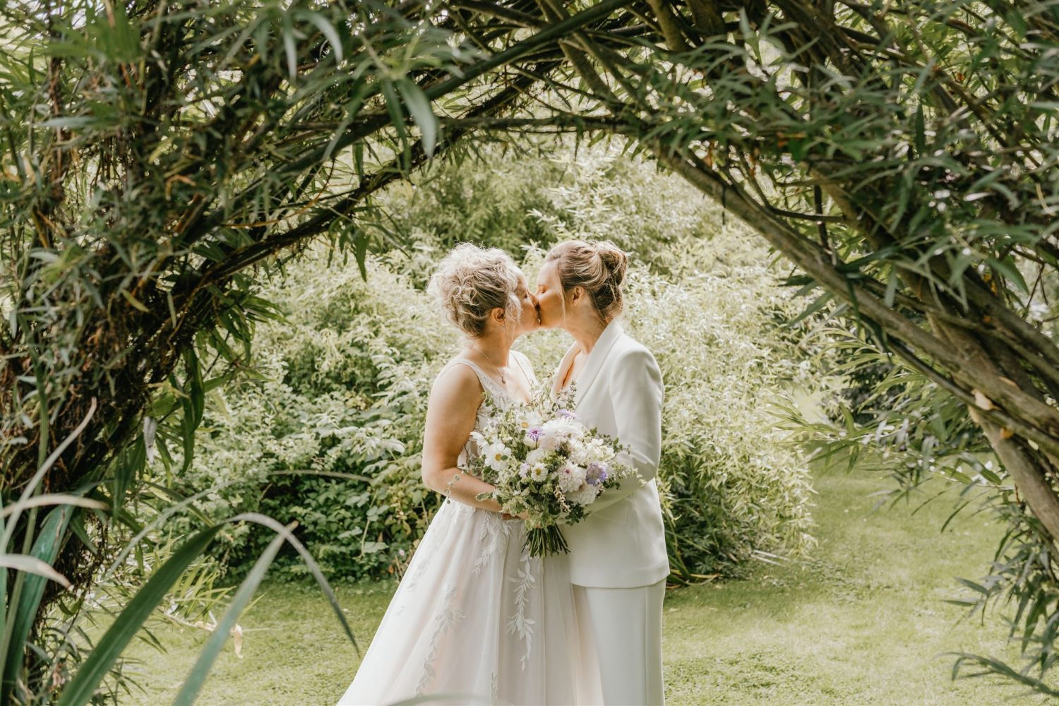 couple portraits in gardens at acorn barn wedding venue in oxfordshire