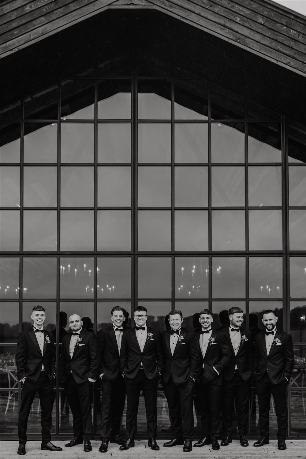groom and groomsmen outside botley hill barn