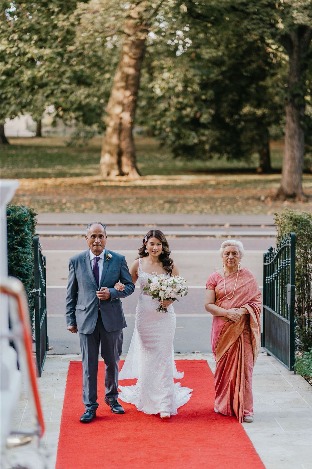 bride's entrance to wedding ceremony in the loggia at mandarin oriental hyde park luxury wedding venue in london