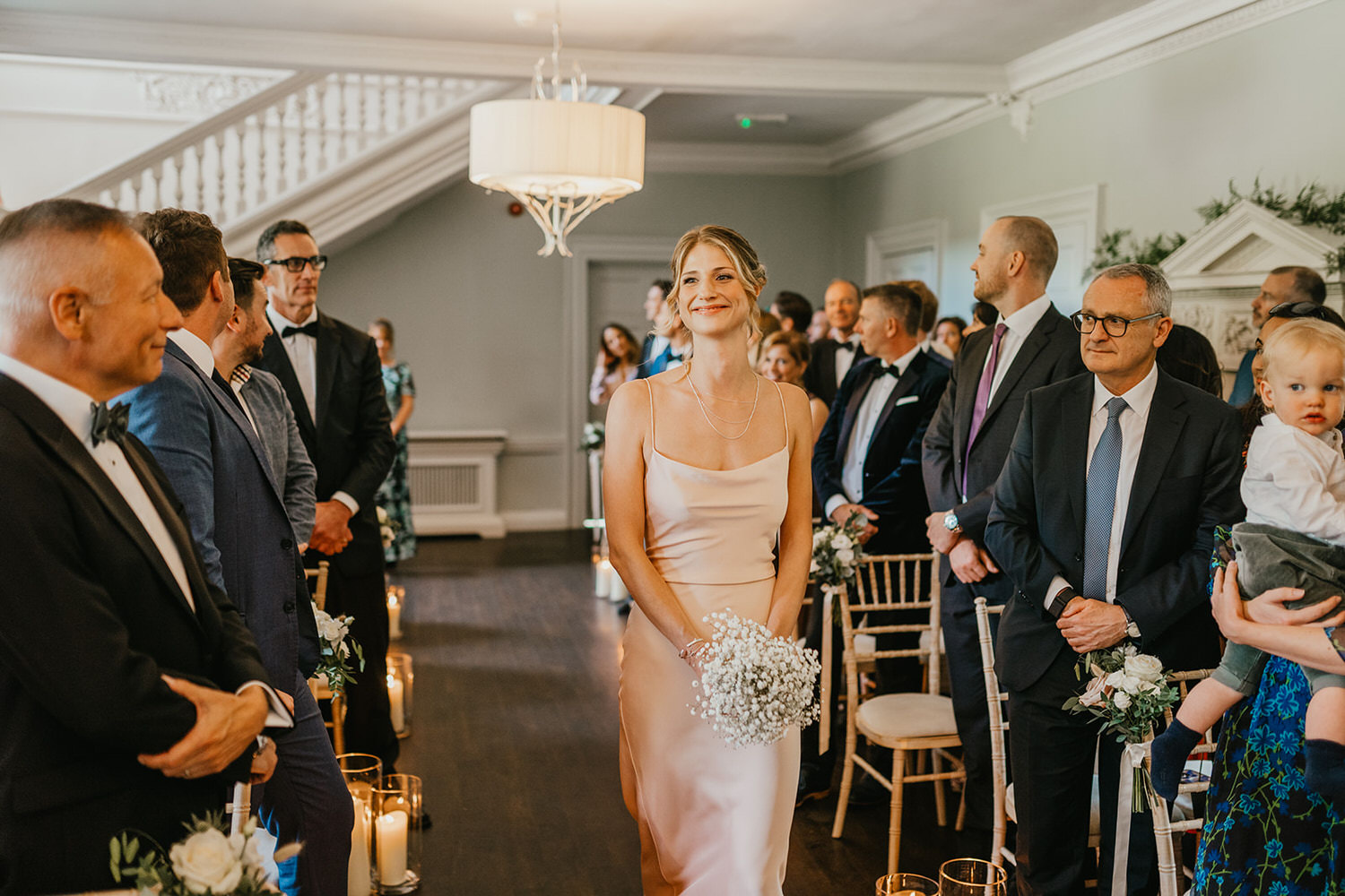 bridesmaid entrance to morden hall wedding ceremony