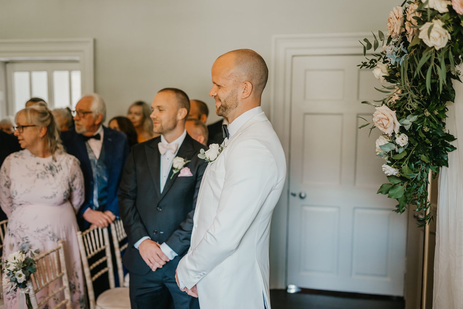 groom during wedding ceremony at morden hall in london