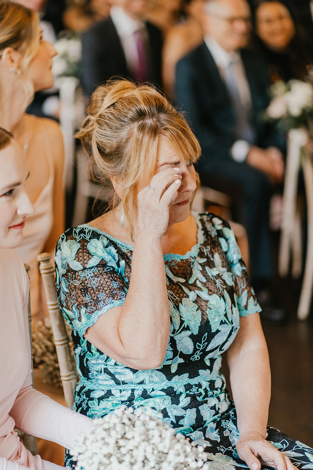 emotional family during wedding ceremony at morden hall in london