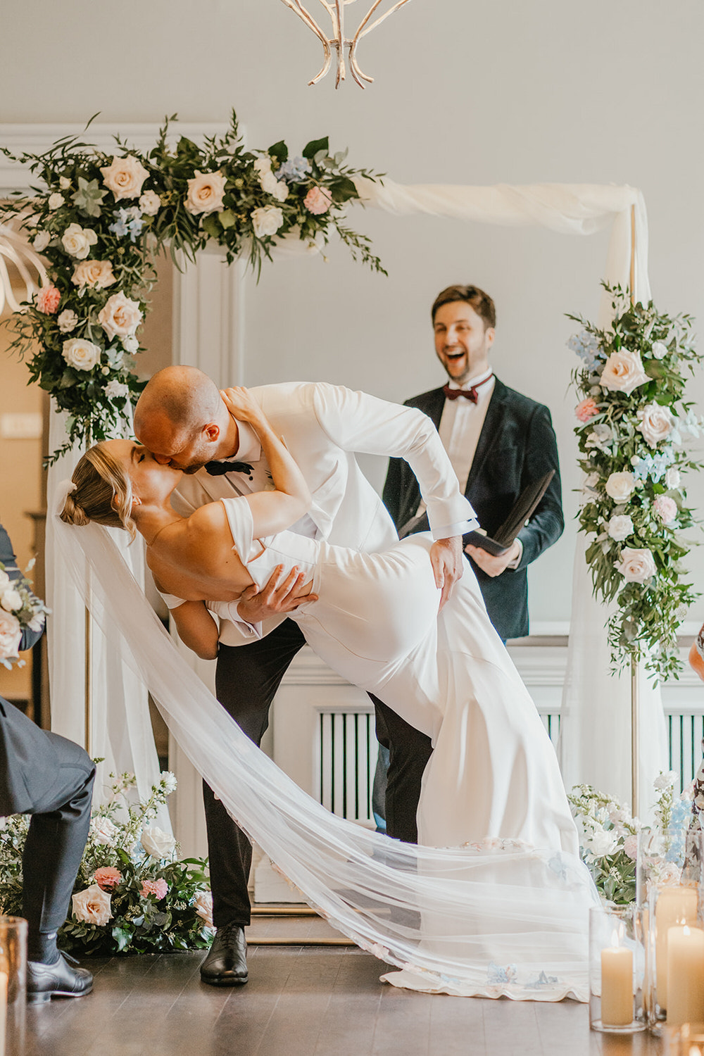 bride and groom first kiss during london wedding ceremony at morden hall