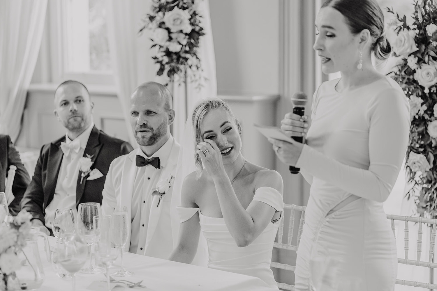 black and white photo of wedding speeches at morden hall wedding