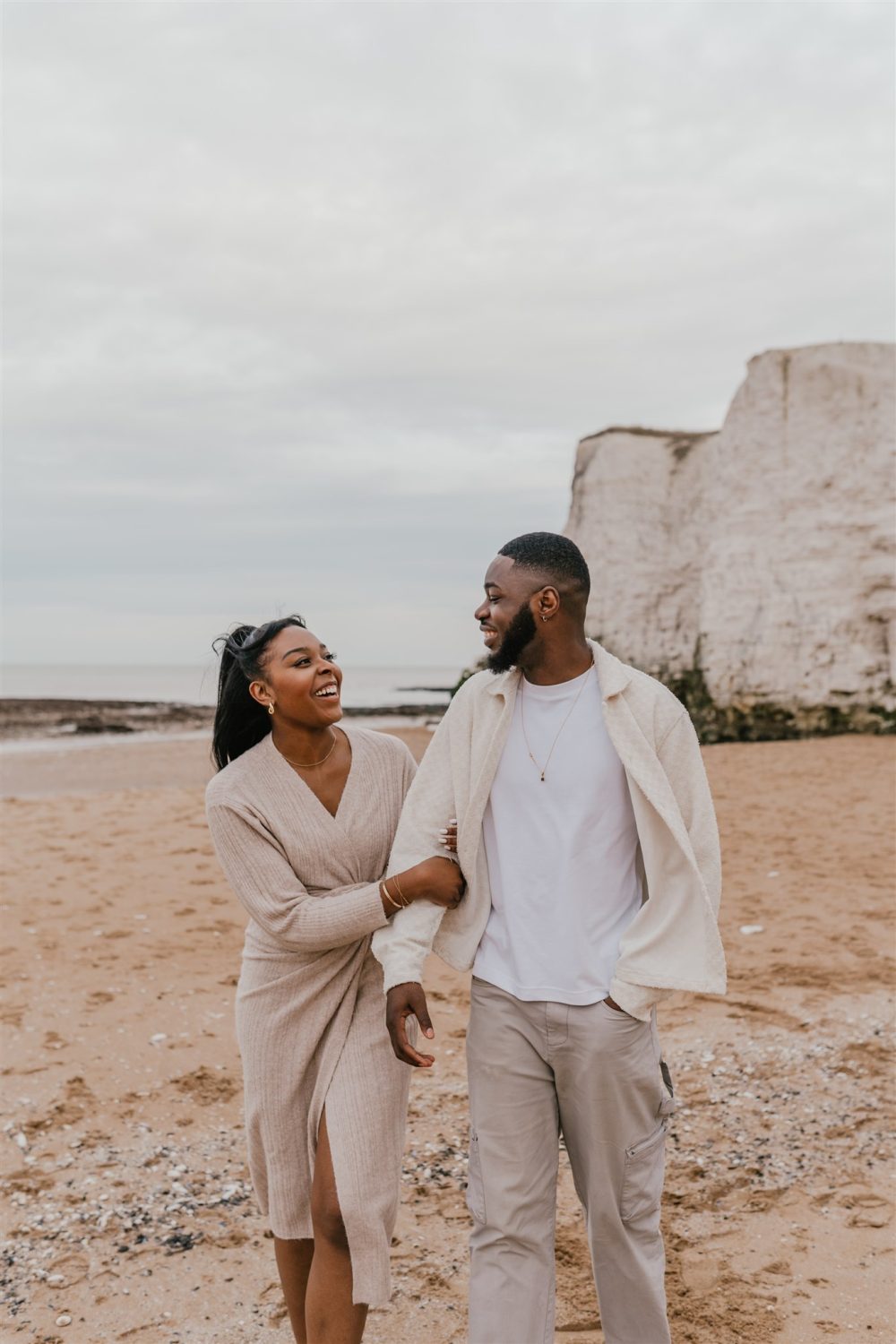 couple walking on the beach at botany bay couple shoot in kent