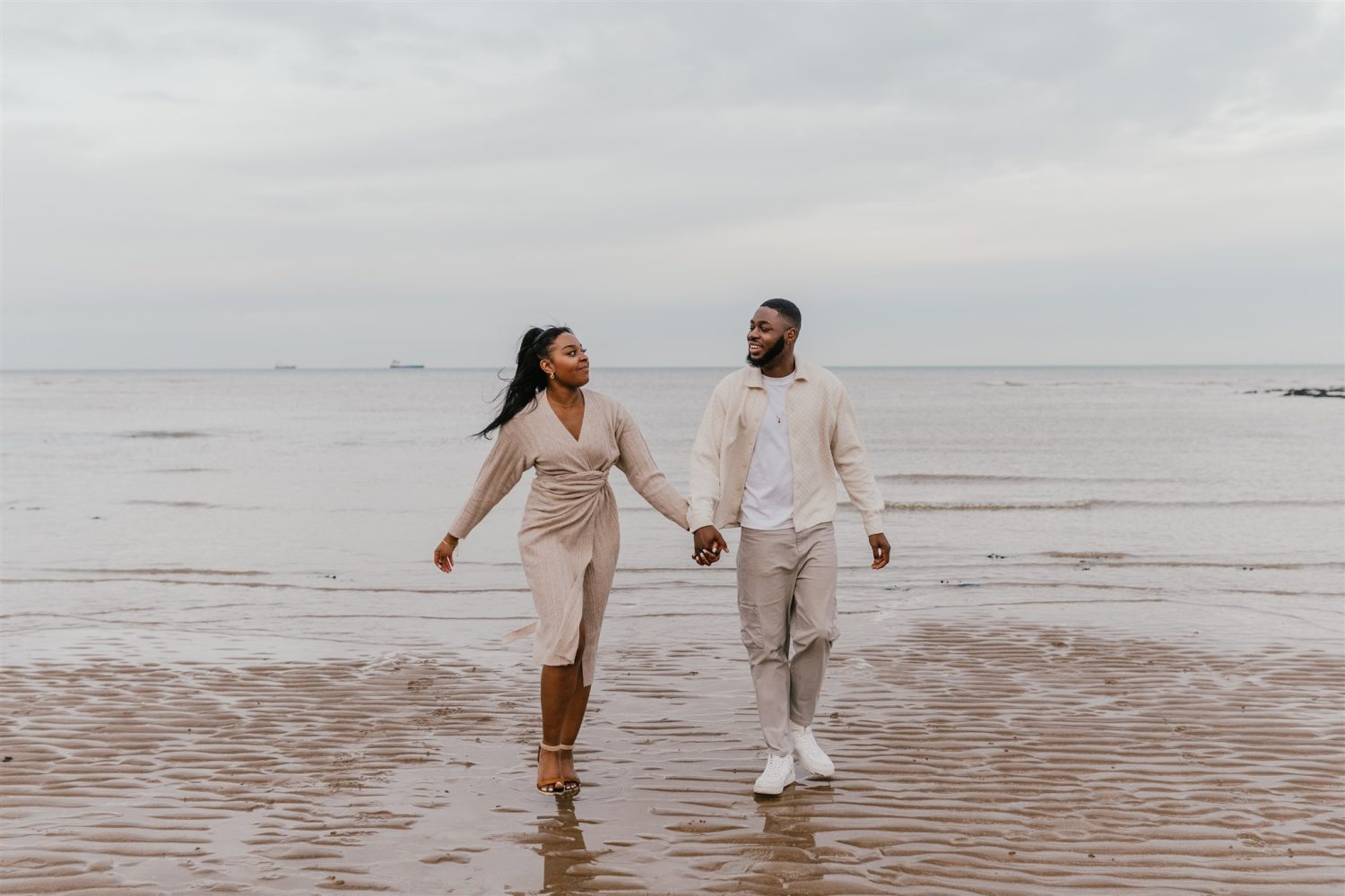 couple walking on the beach at botany bay couple shoot in kent