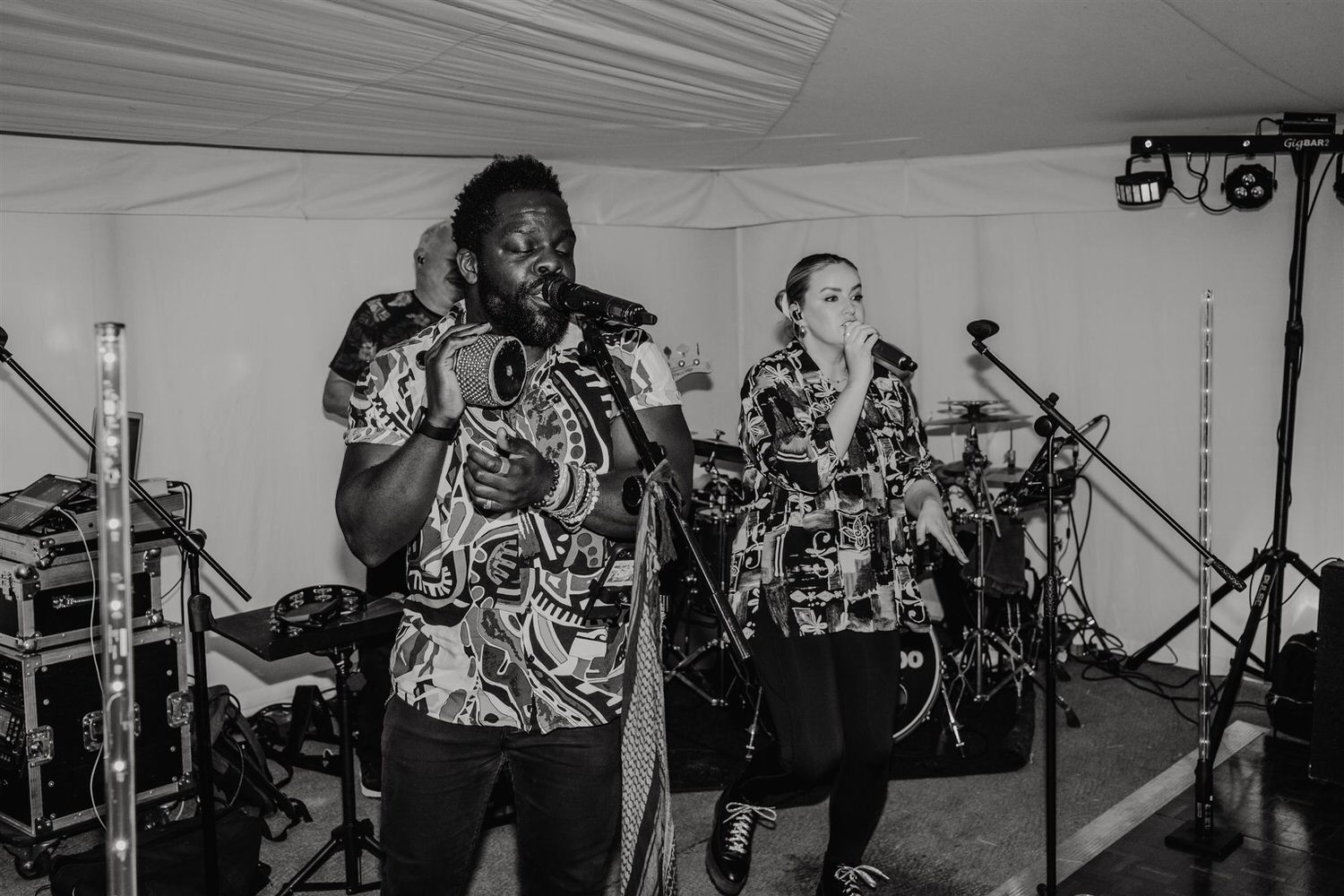 black and white photo of wedding band Groovezoo