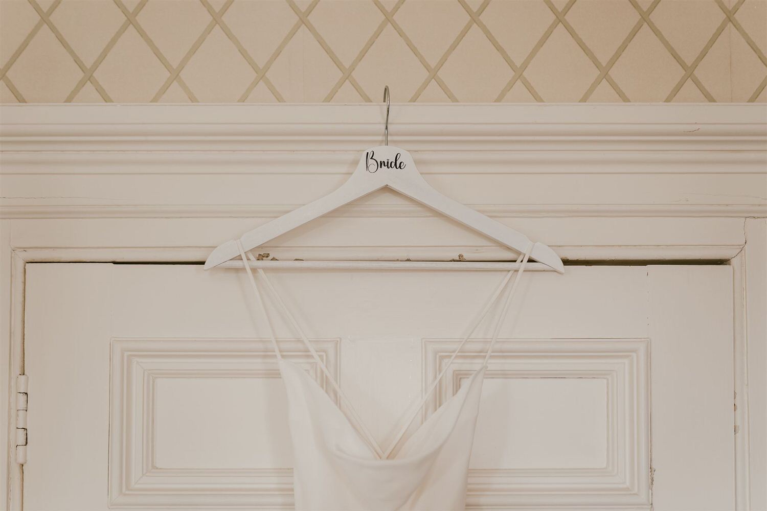 bride's dress hanging at mount ephraim wedding in kent
