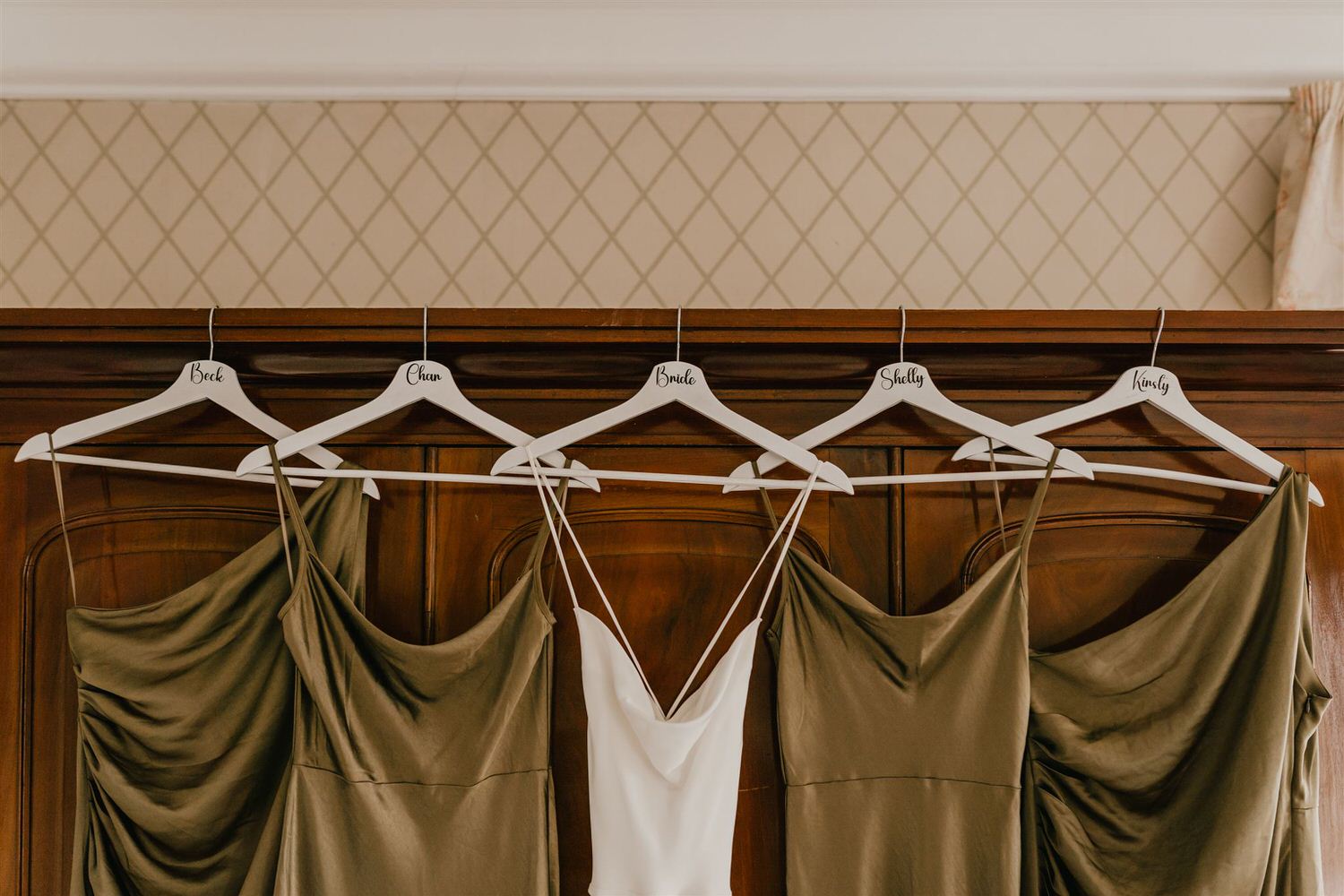 bride and bridesmaid dresses hanging at mount ephraim wedding in kent