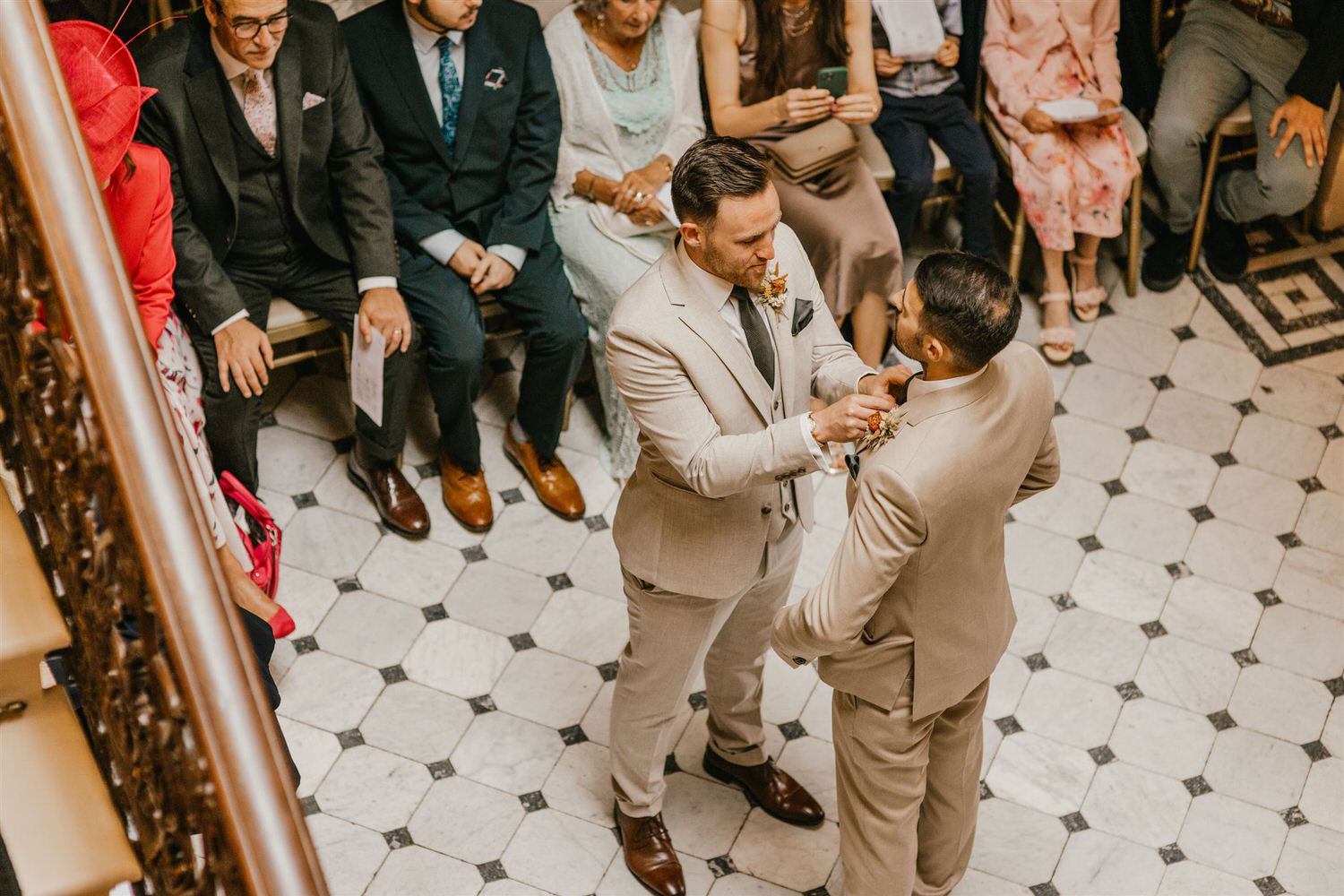 groom and best man get ready for indoor ceremony at mount ephraim wedding in kent