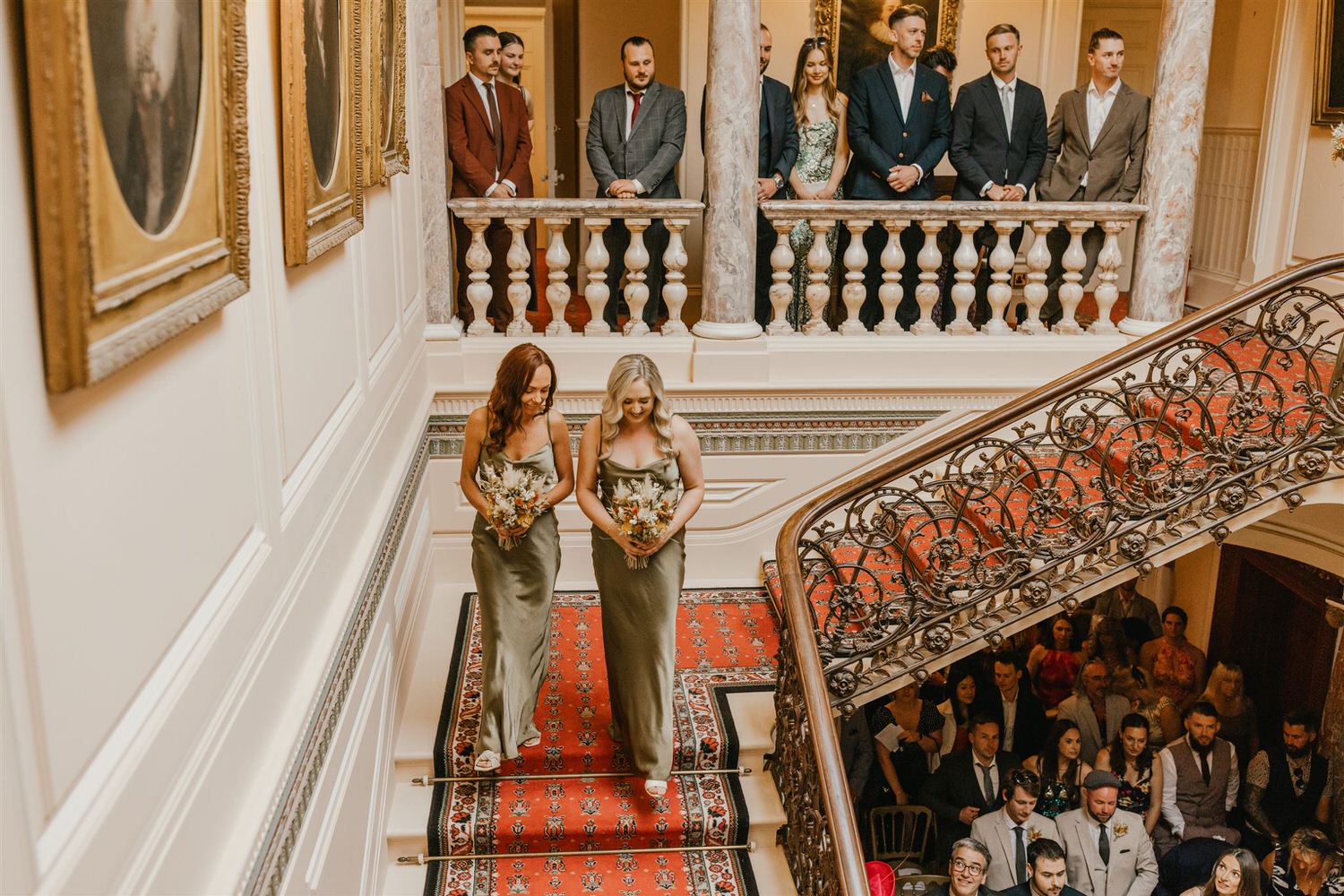 bridesmaids entrance down the staircase at mount ephraim wedding ceremony in kent