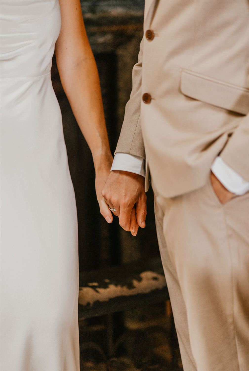 bride and groom hold hands during ceremony at mount ephraim wedding in kent