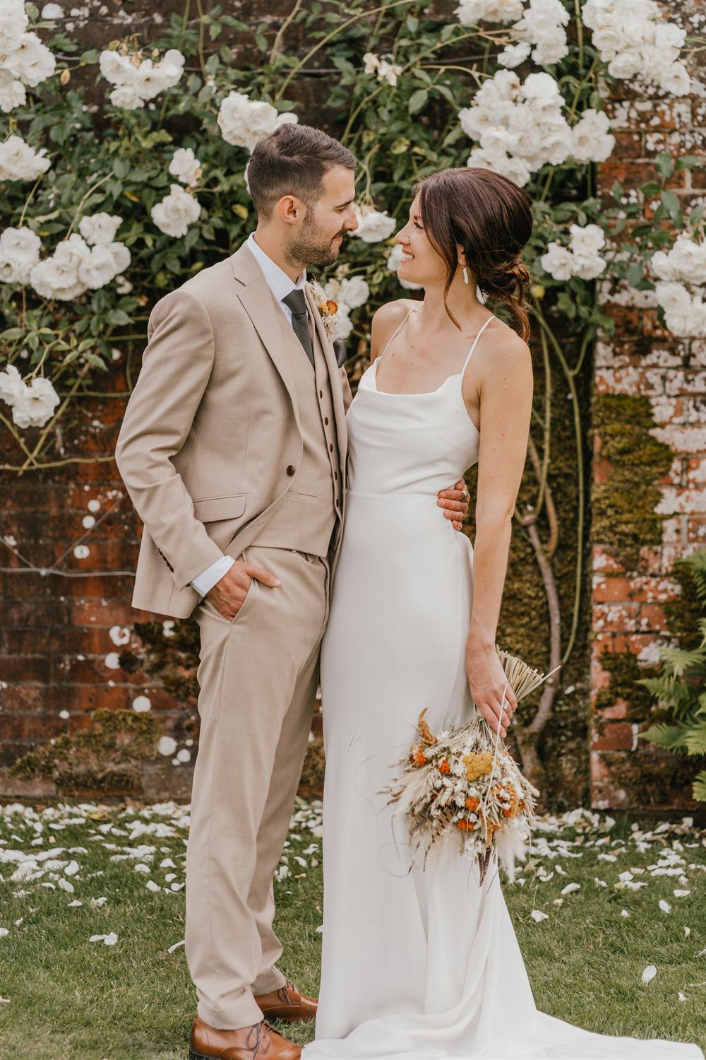couple portraits in the gardens at mount ephraim wedding venue in kent