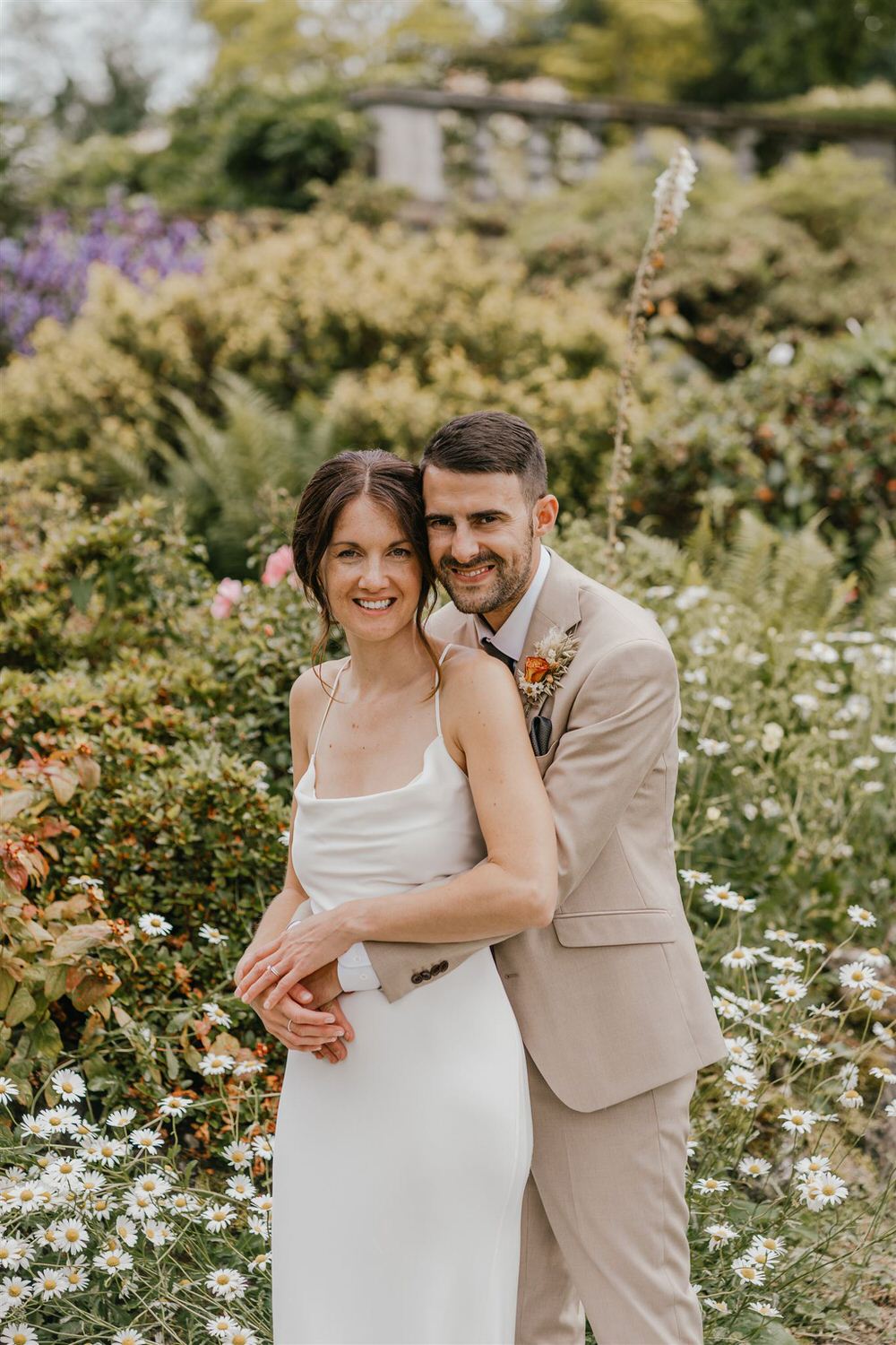 couple portraits in the gardens at mount ephraim wedding venue in kent
