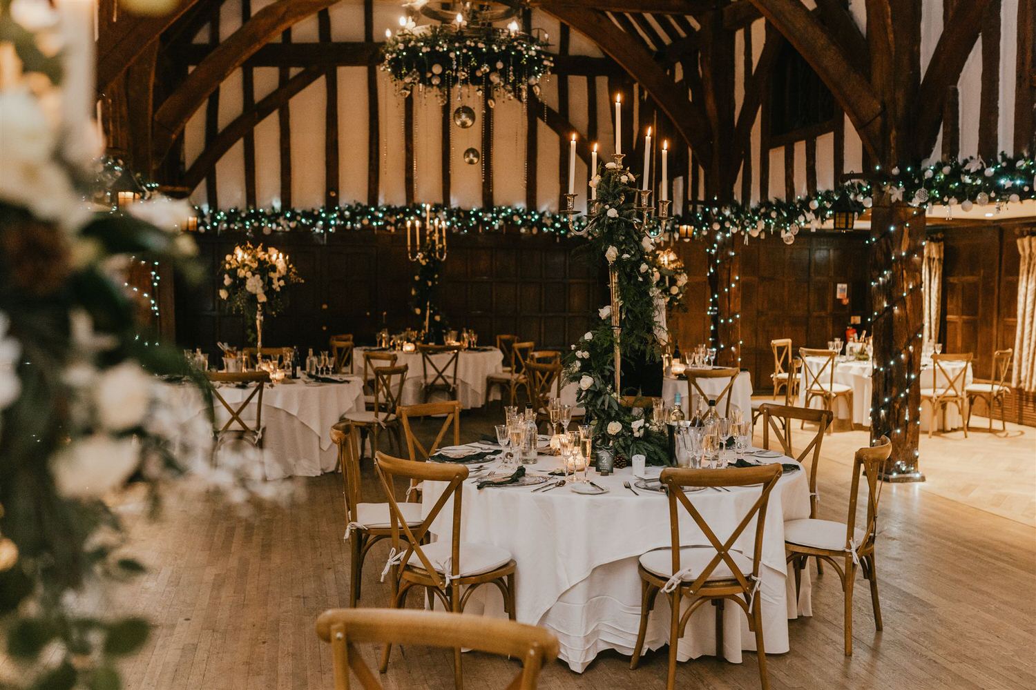 wedding breakfast setup with winter wedding decor at great fosters in surrey