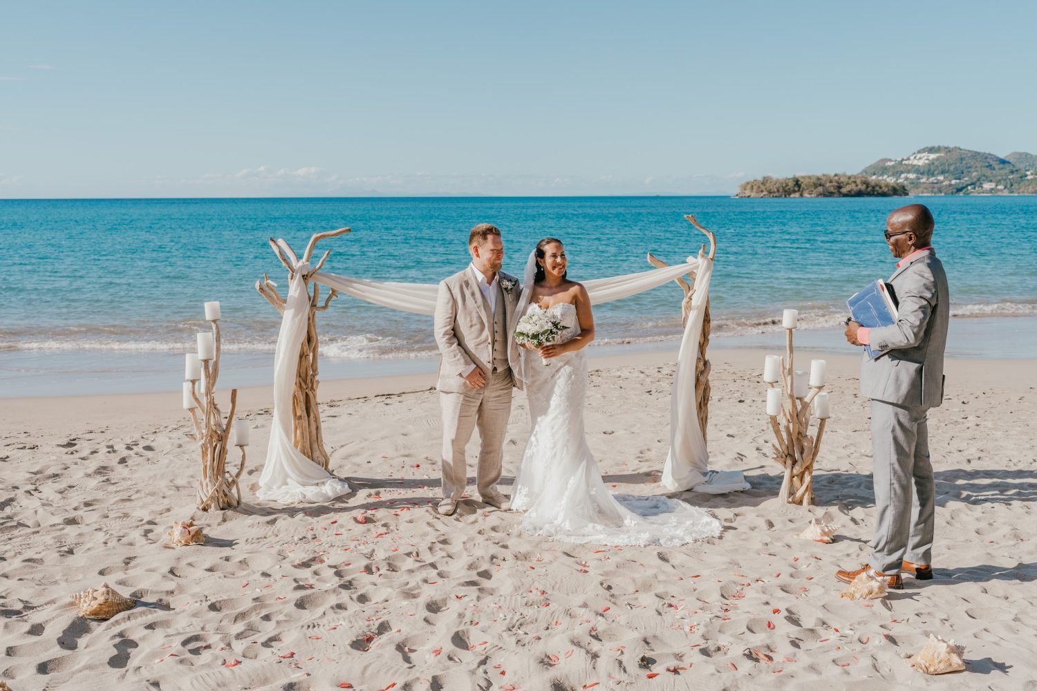 beach wedding ceremony for saint lucia elopement at stolentime resort wedding venue in the caribbean