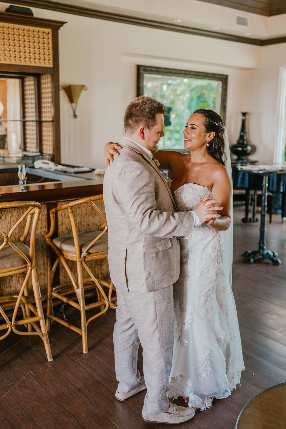 bride and groom first dance in champagne bar at stolentime resort saint lucia wedding venue
