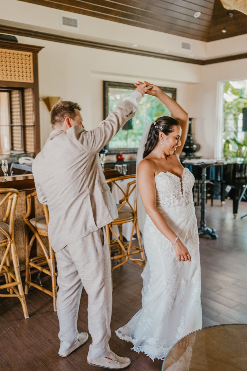 bride and groom first dance in champagne bar at stolentime resort saint lucia wedding venue