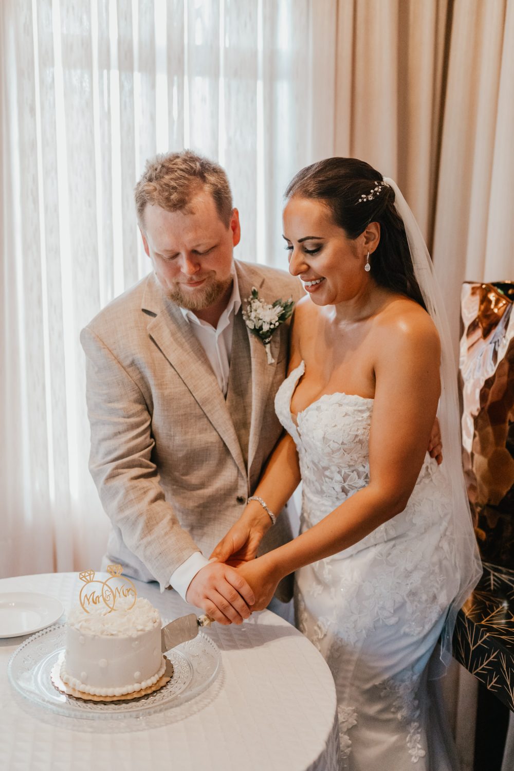 bride and groom cut wedding cake at stolentime resort saint lucia wedding venue