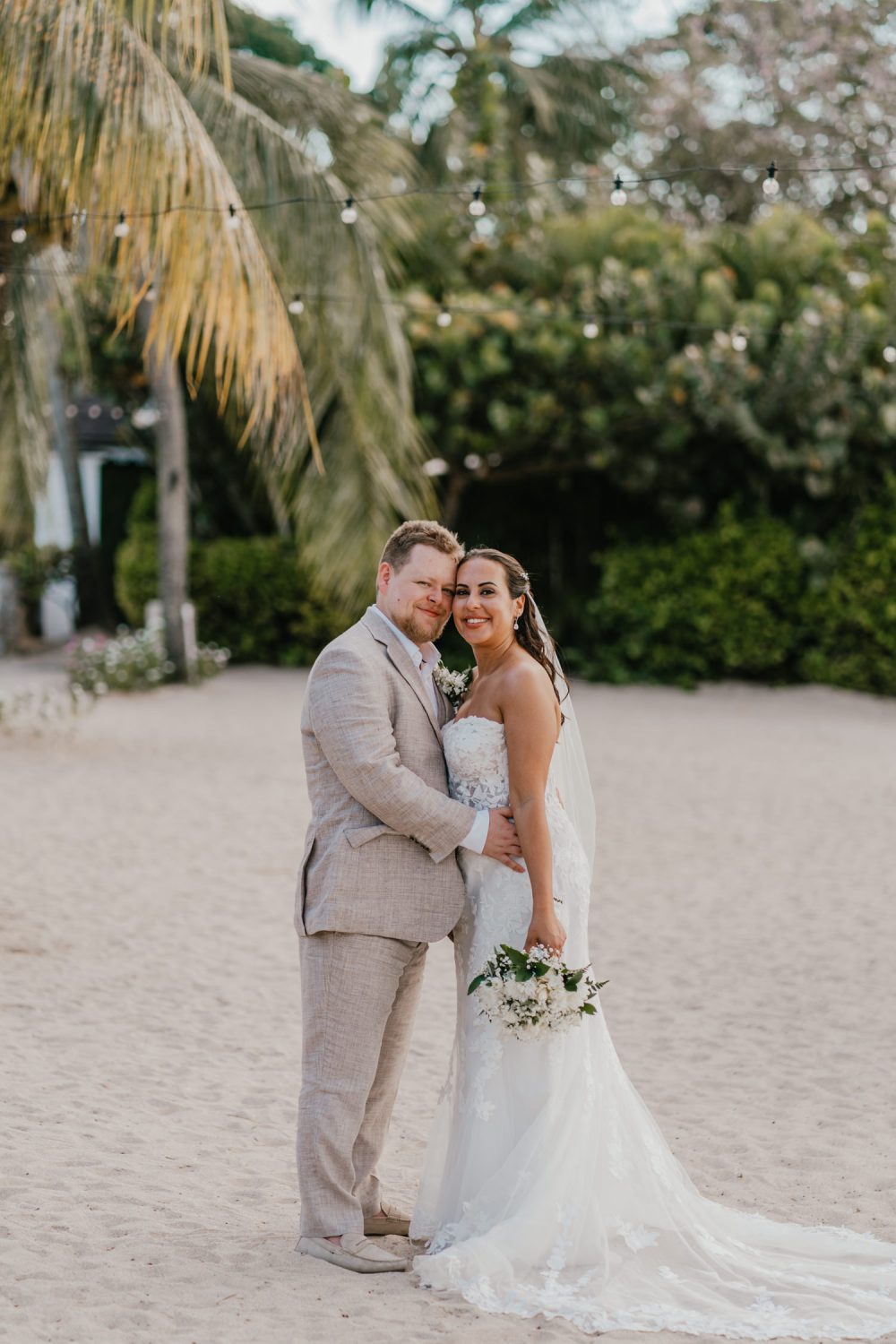 bride and groom on the beach at stolentime resort during their saint lucia elopement
