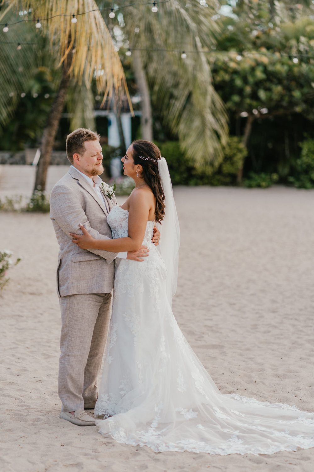 bride and groom on the beach at stolentime resort during their saint lucia elopement
