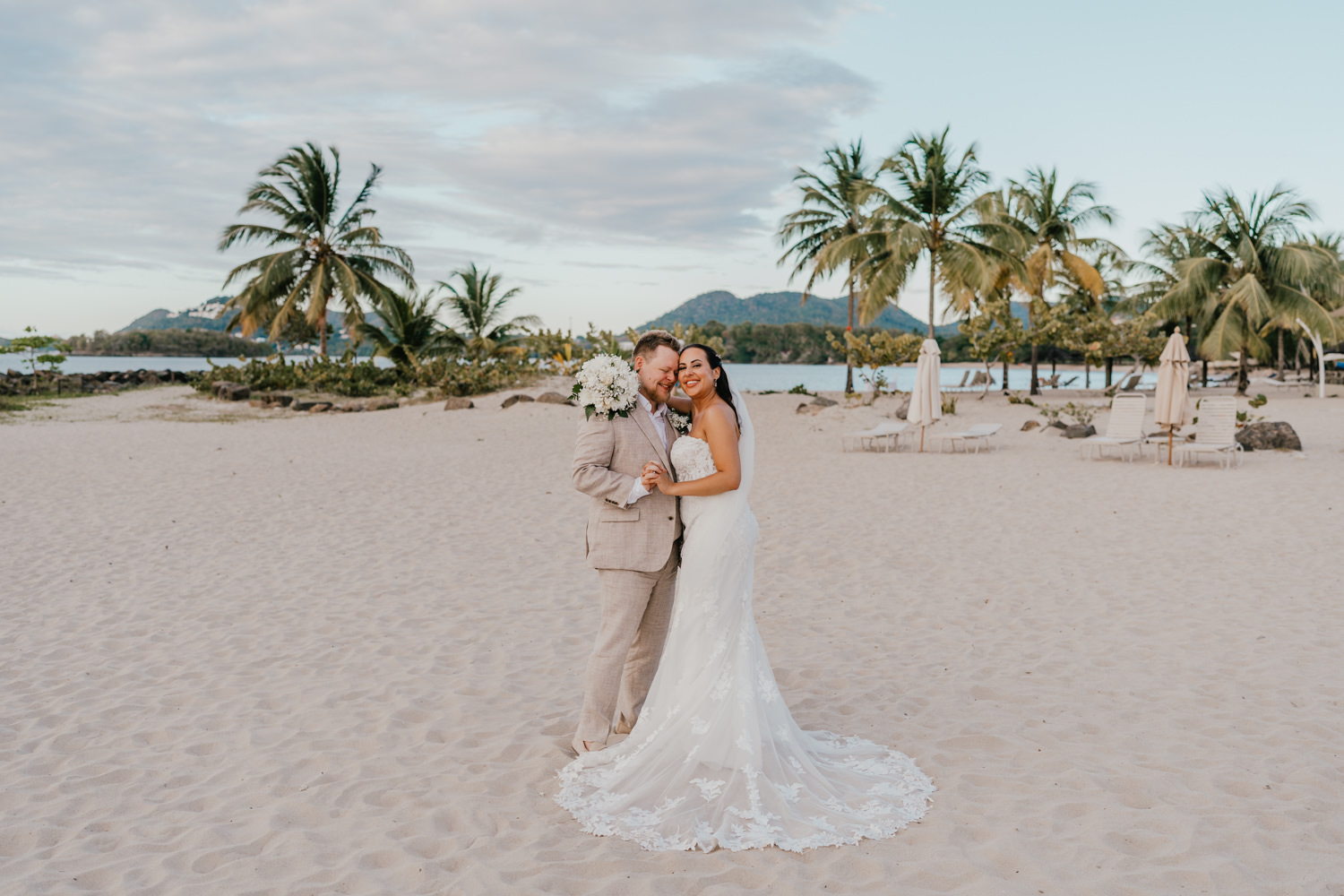 bride and groom on the beach at stolentime resort saint lucia wedding venue