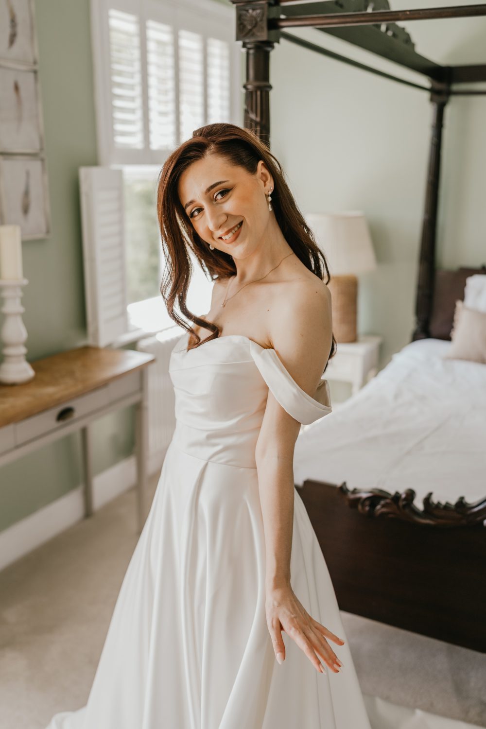 bridal portraits in the bedroom at northbrook park wedding venue
