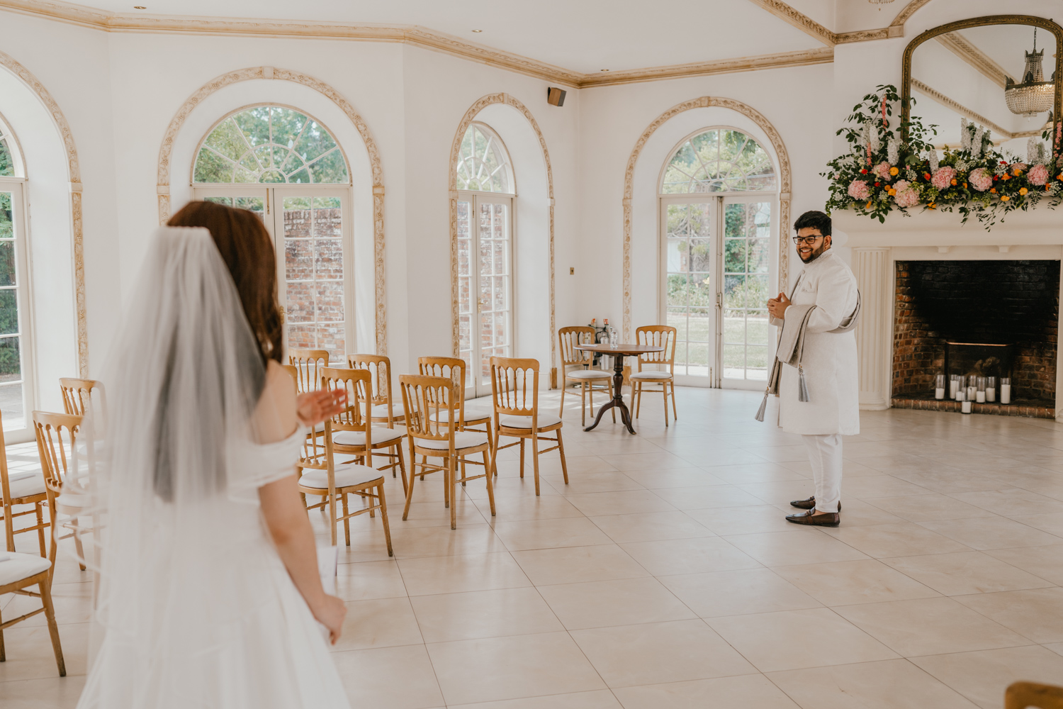 bride and groom first look at northbrook park wedding
