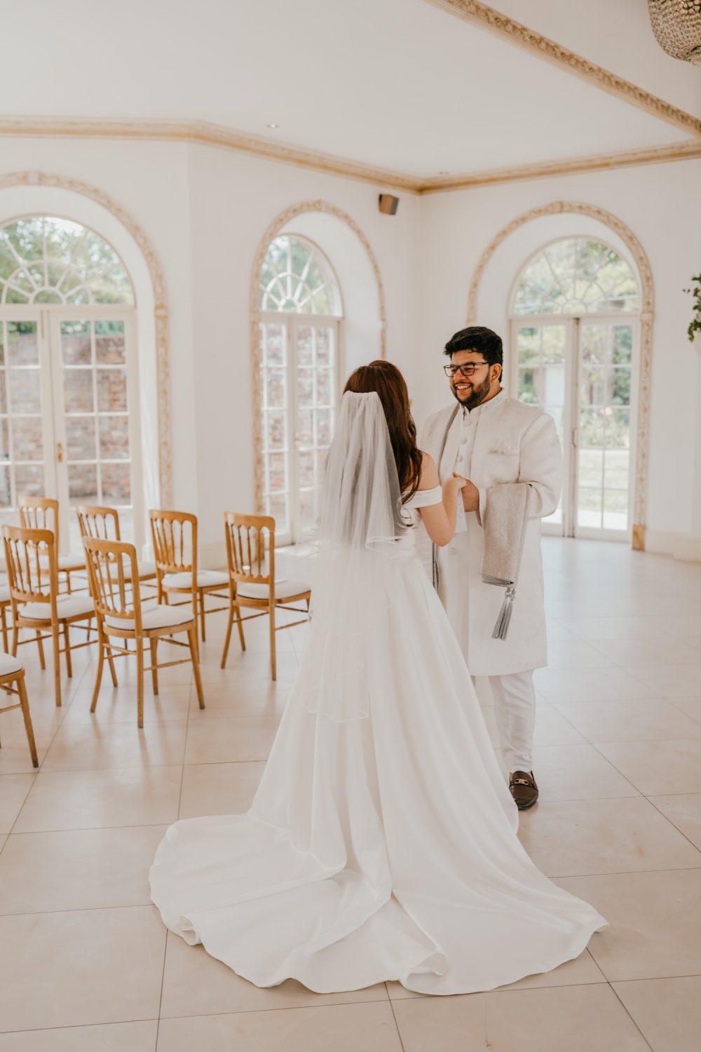 bride and groom first look at northbrook park wedding