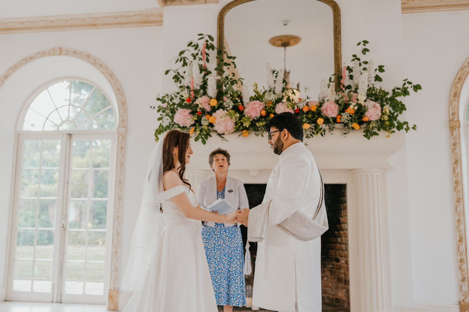 bride and groom exchange vows at northbrook park wedding
