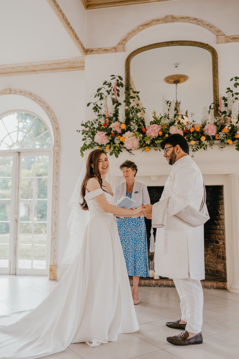 bride and groom exchange vows at northbrook park wedding