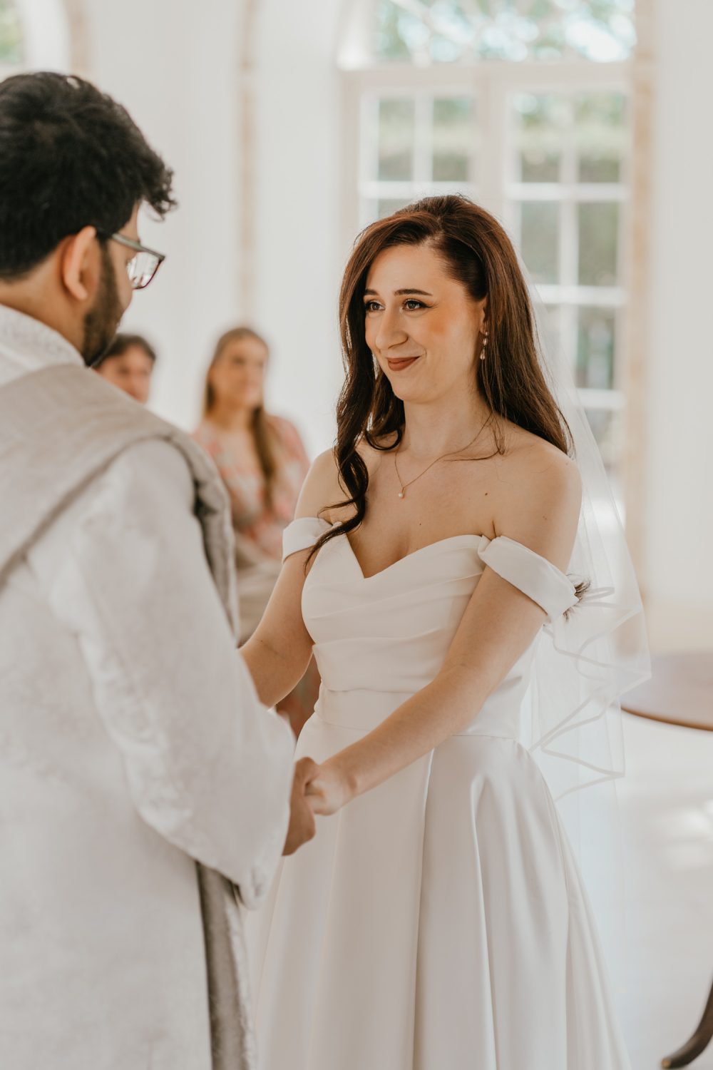 bride and groom exchange vows at northbrook park wedding