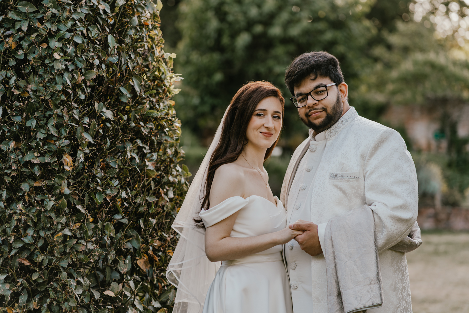 bride and groom golden hour couple portraits in the walled garden at northbrook park wedding