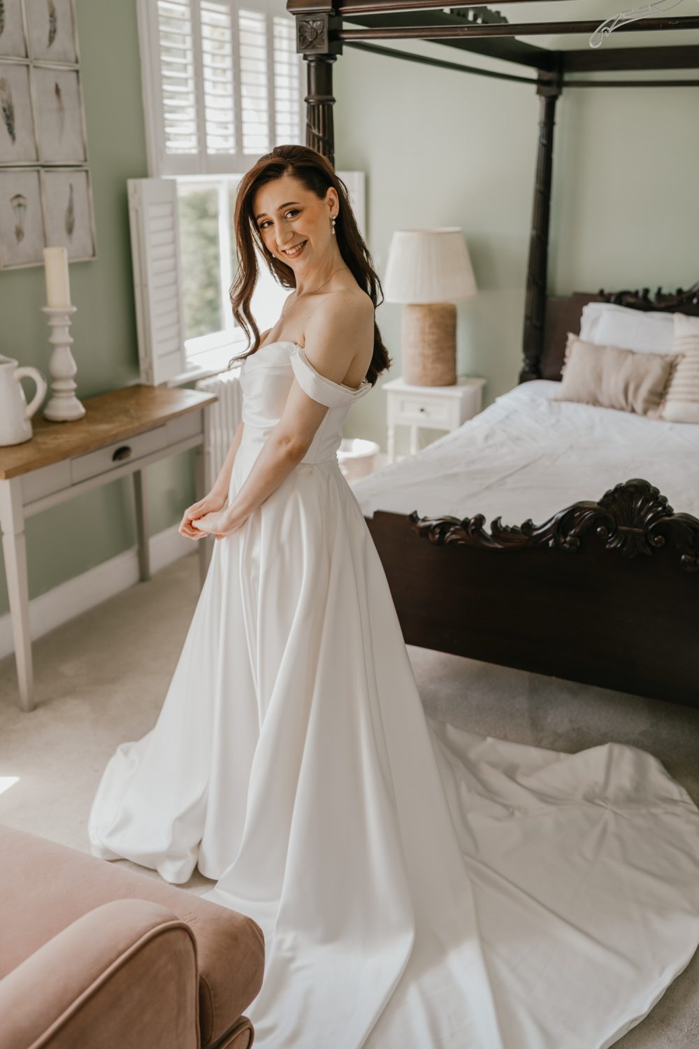 bridal portraits in the bedroom at northbrook park wedding venue