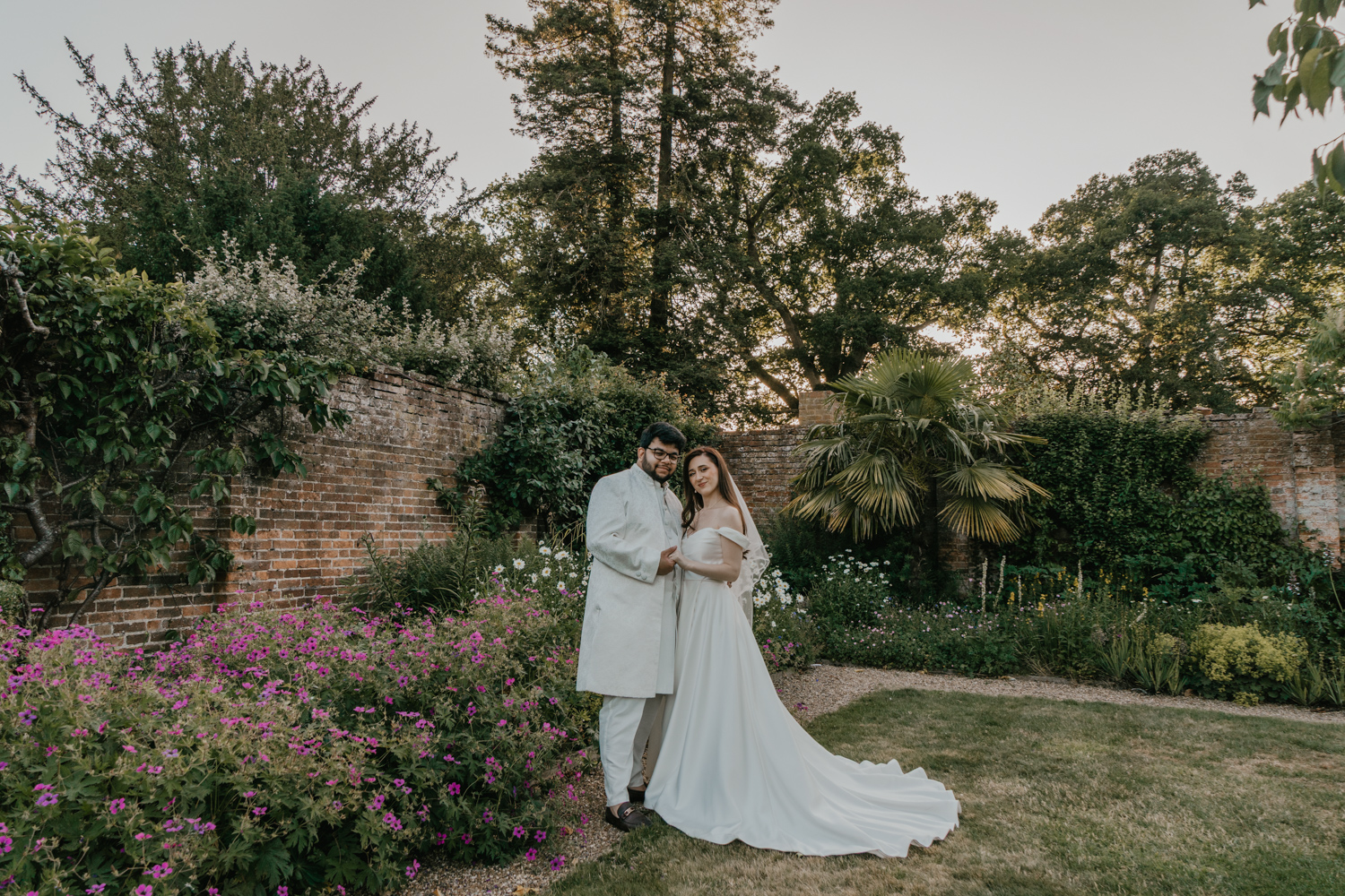 bride and groom golden hour couple portraits in the walled garden at northbrook park wedding venue in farnham