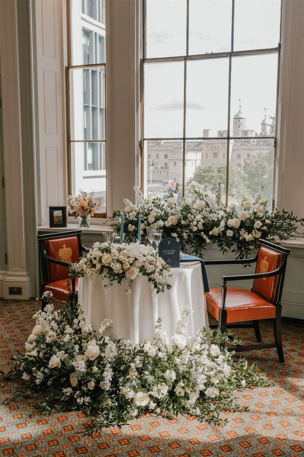 wedding breakfast setup in the library at trinity house wedding venue in london