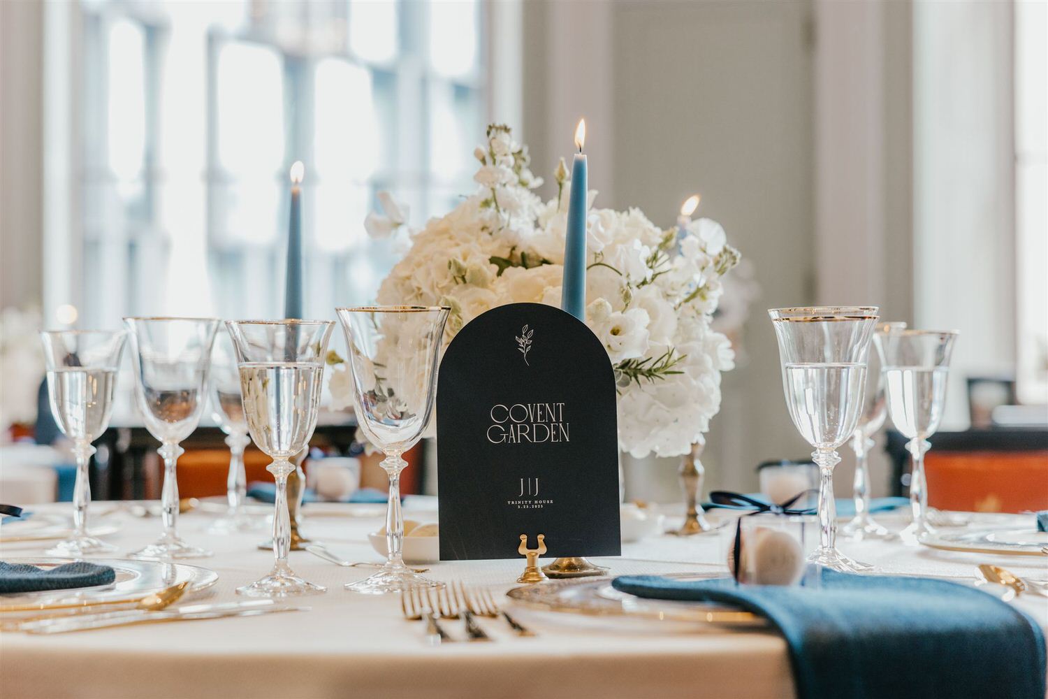 wedding breakfast setup in the library at trinity house wedding venue in london