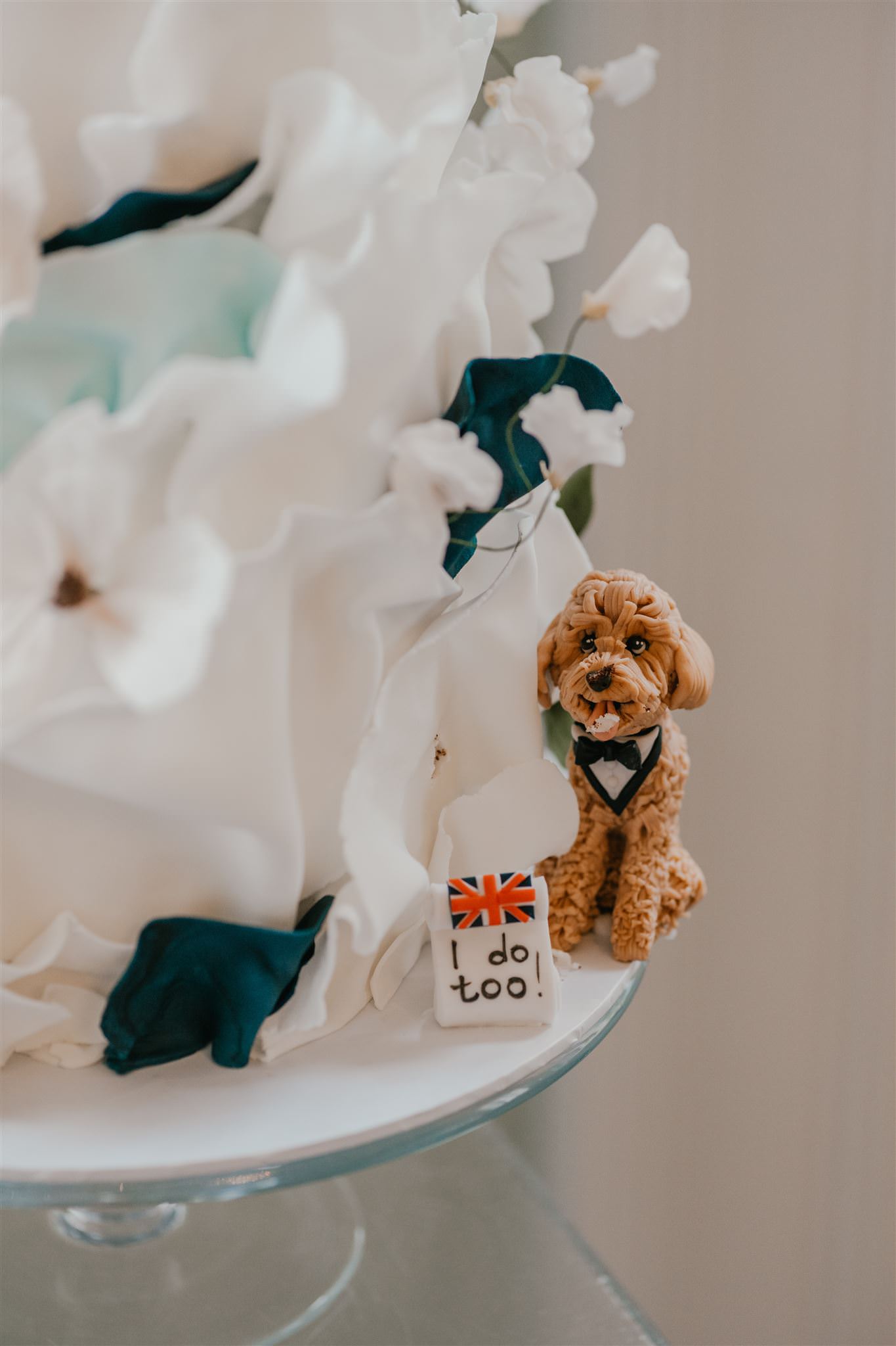 wedding cake dog topper in the library at trinity house wedding venue in london
