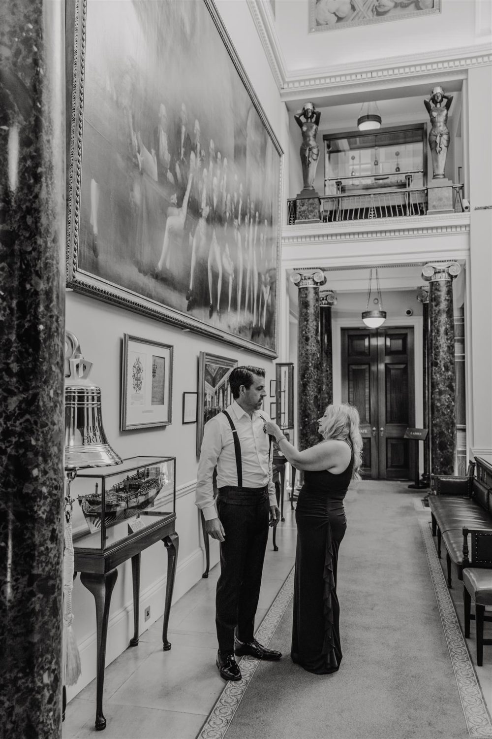 black and white photo of wedding party getting ready at trinity house london wedding