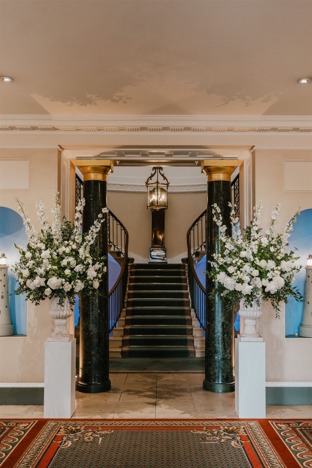 flower urns in the lobby of trinity house in london