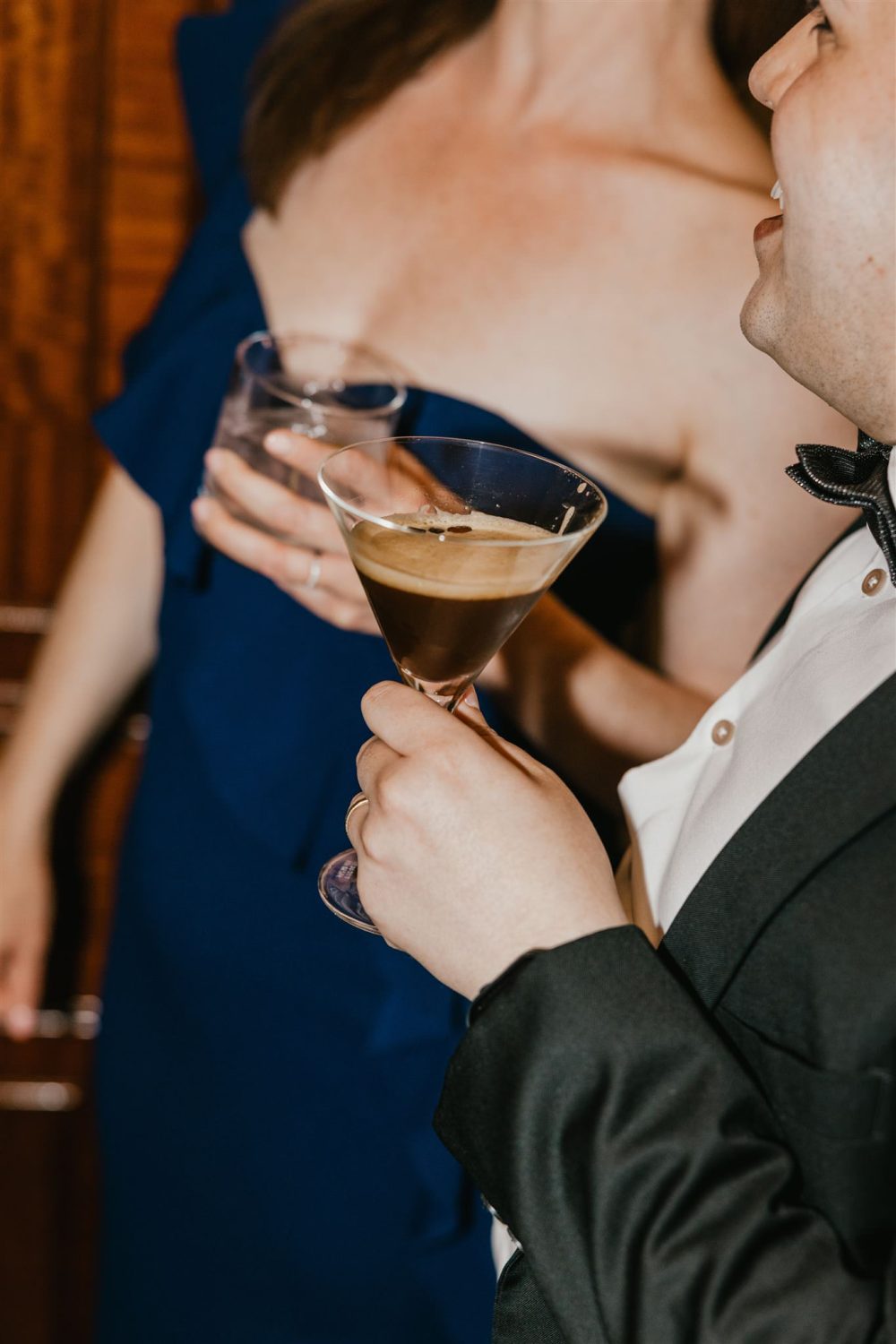 guest drinking an espresso martini